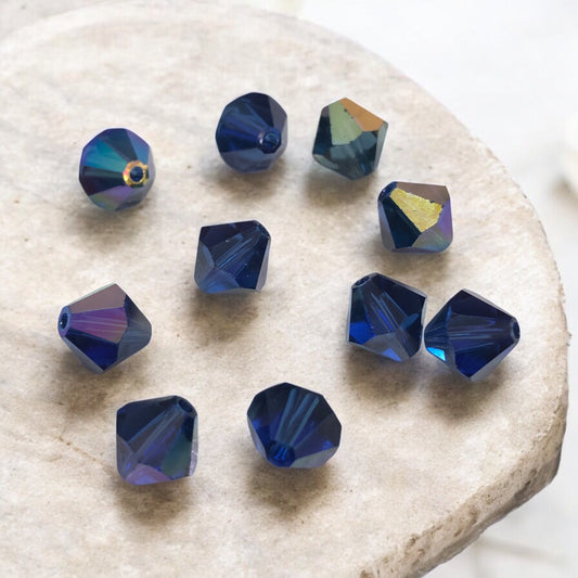 Swarovski 8mm Piramit (Bicone ) Şeffaf Parlak Mavi ( Capri Blue AB) - 001