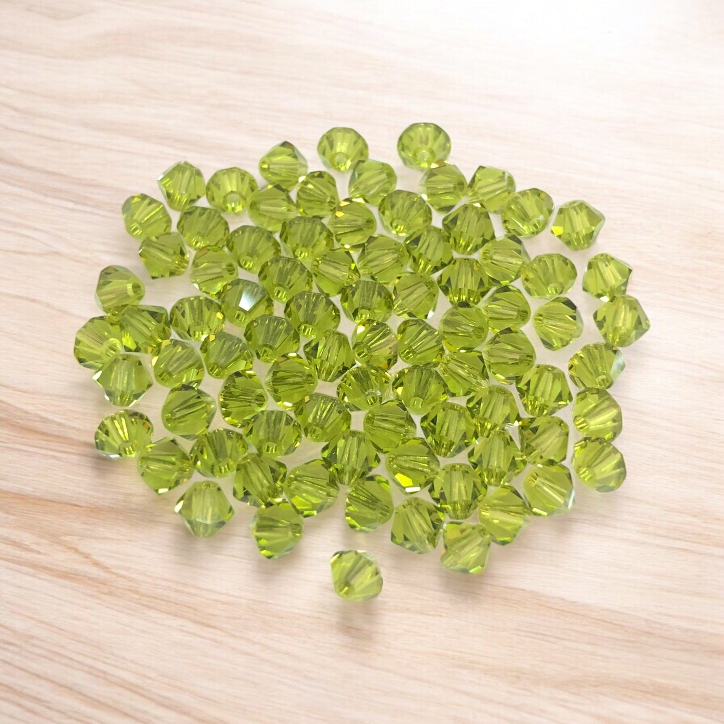 Swarovski 4mm Piramit (Bicone ) Şeffaf Açık Yağ Yeşili - 006