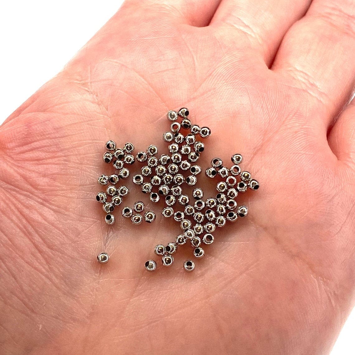 Rhodinierter 2-mm-Kugelabstandshalter