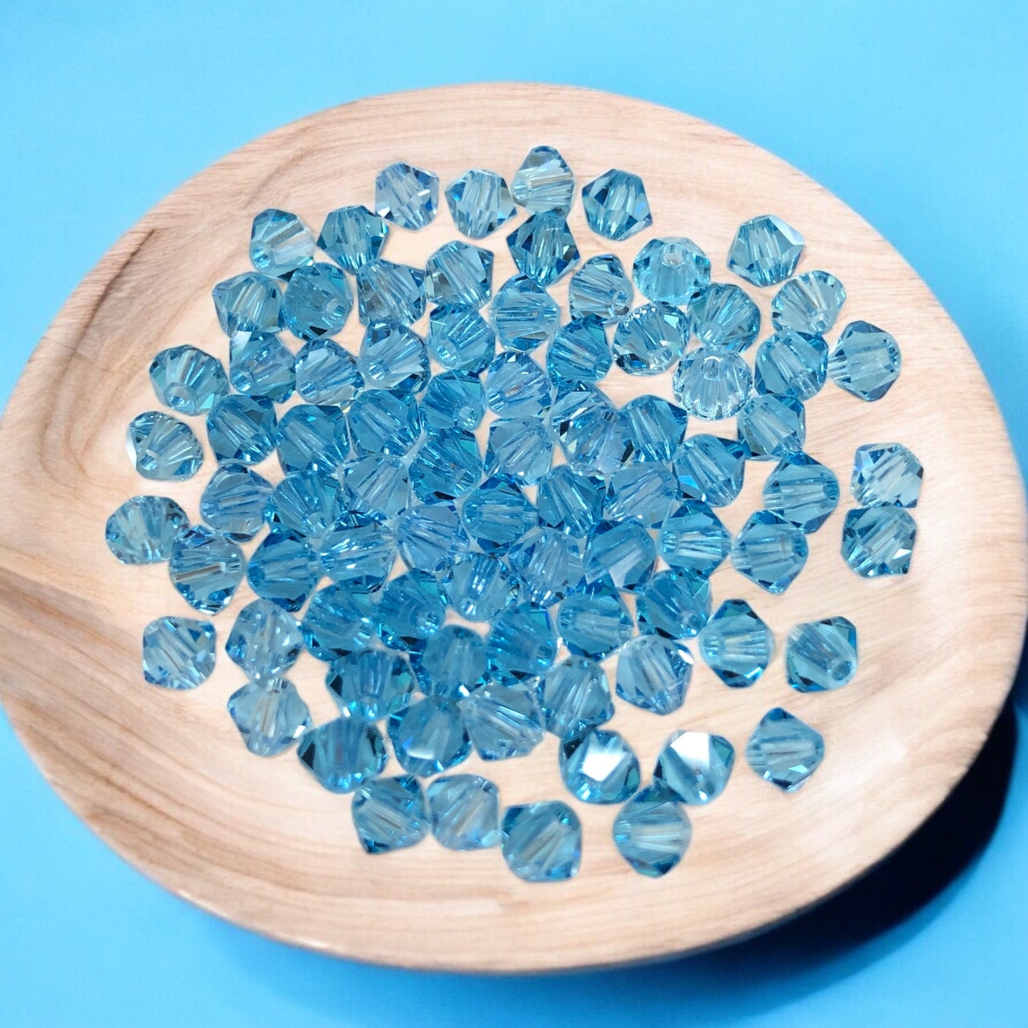 Swarovski 4mm Piramit (Bicone )  Şeffaf Aquamarine- 013